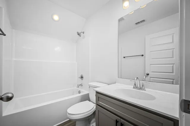 an empty room with a empty space and a window