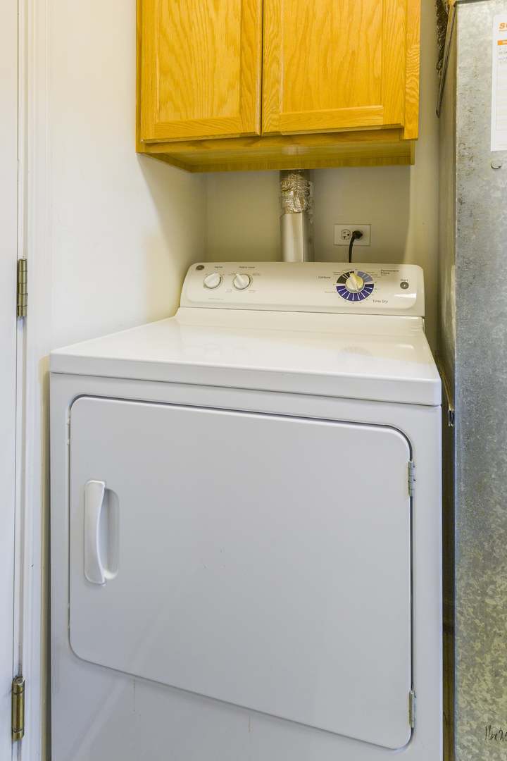 147 Heather Glen Drive, Unit 147 Aurora, IL 60504 - Photo 13 of 14 a utility room with dryer and washer