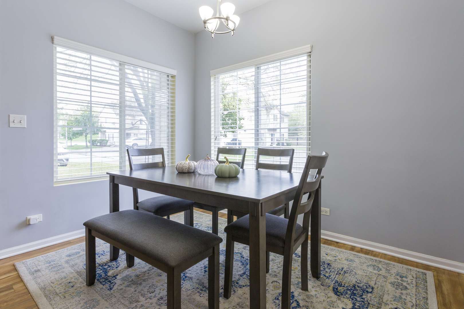 147 Heather Glen Drive, Unit 147 Aurora, IL 60504 - Photo 6 of 14 a view of a dining room with furniture window and outside view