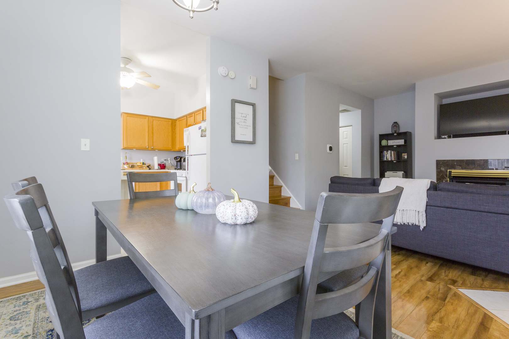 147 Heather Glen Drive, Unit 147 Aurora, IL 60504 - Photo 8 of 14 a view of a dining room with furniture and wooden floor