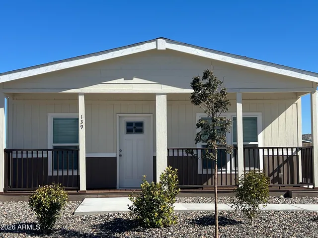 a front view of house with yard