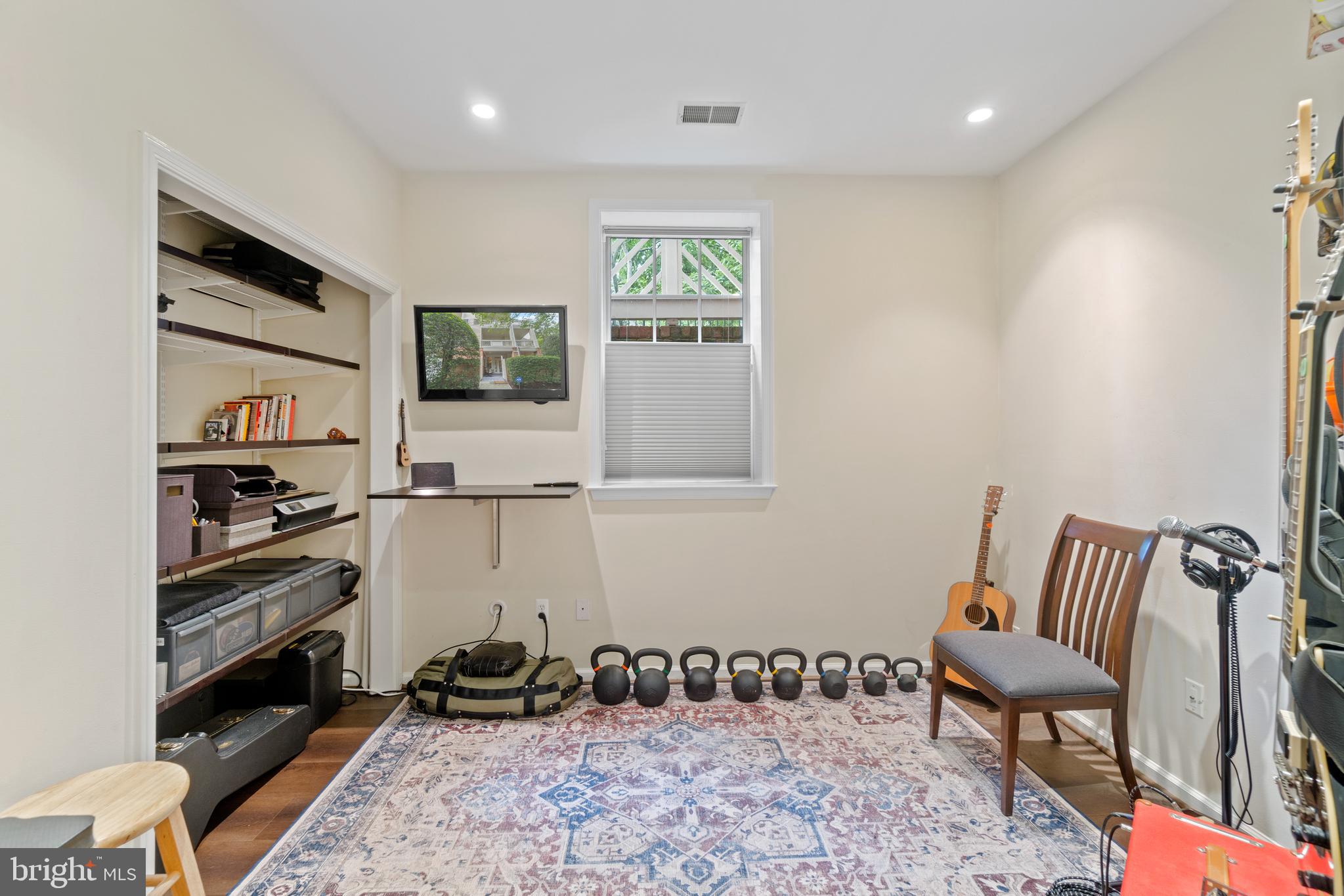 1301 Garden Wall Court, Unit 901 Reston, VA 20194 - Photo 18 of 30 2nd bedroom with standing desk and tv monitor