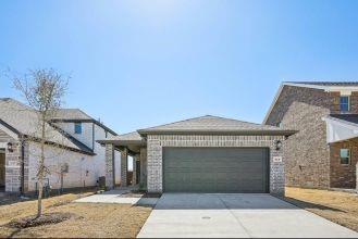 519 Ridgedale Drive McKinney, TX 75071 - Photo 1 of 26 a front view of a house with a garage