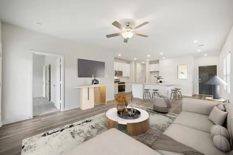 519 Ridgedale Drive McKinney, TX 75071 - Photo 11 of 26 a living room with furniture and a view of kitchen