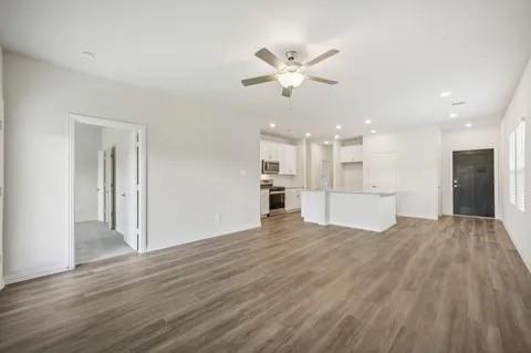 519 Ridgedale Drive McKinney, TX 75071 - Photo 12 of 26 a view of a kitchen with wooden floor and a kitchen