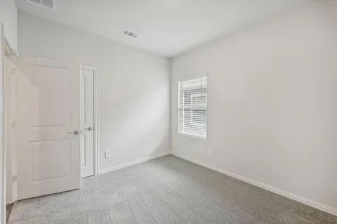 519 Ridgedale Drive McKinney, TX 75071 - Photo 21 of 26 a view of an empty room with a window