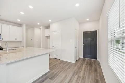 519 Ridgedale Drive McKinney, TX 75071 - Photo 10 of 26 a view of kitchen with wooden floor