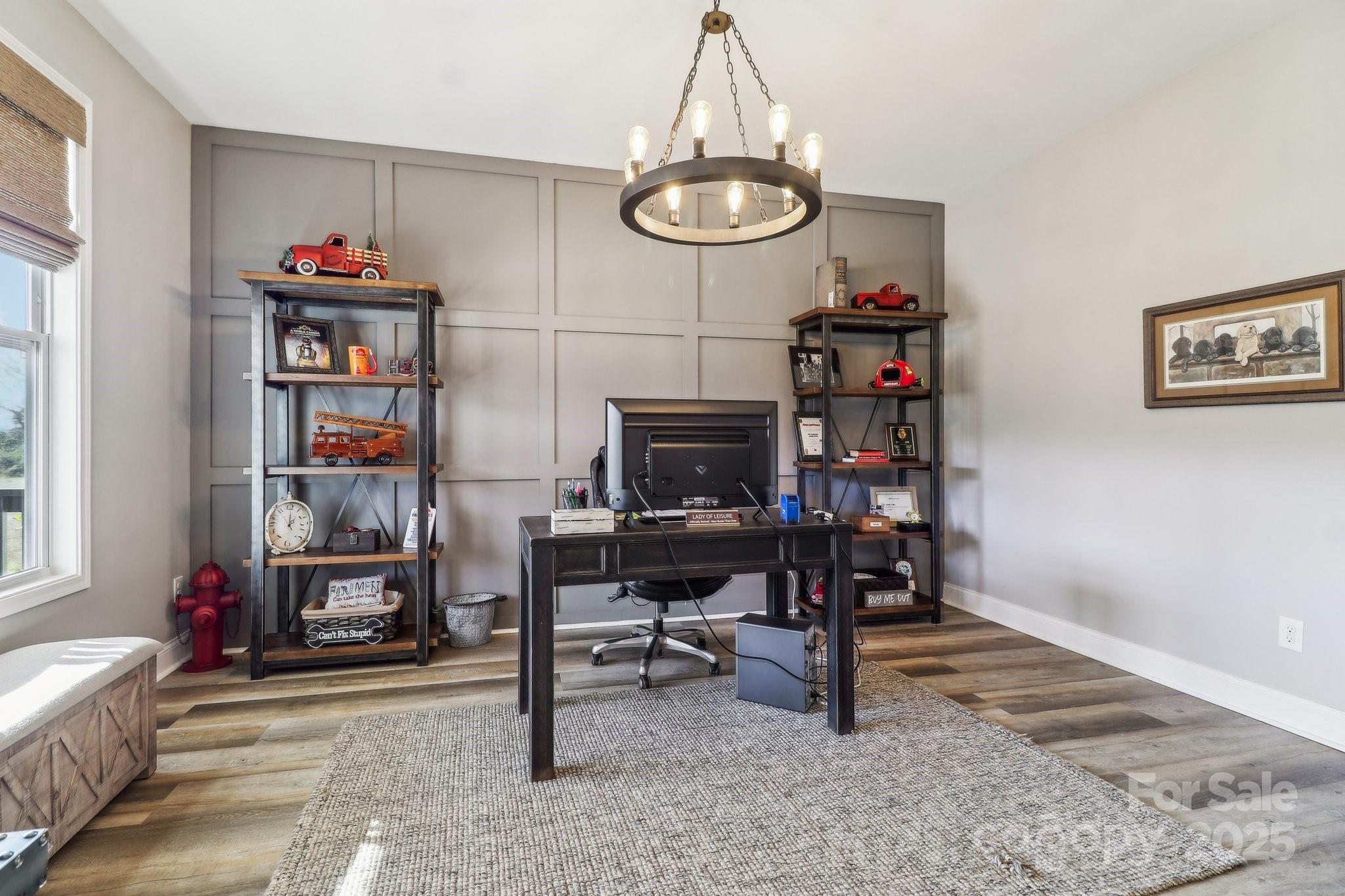 754 Culp Fergusen Drive Lancaster, SC 29720 - Photo 14 of 35 a living room with lots of furniture and a chandelier