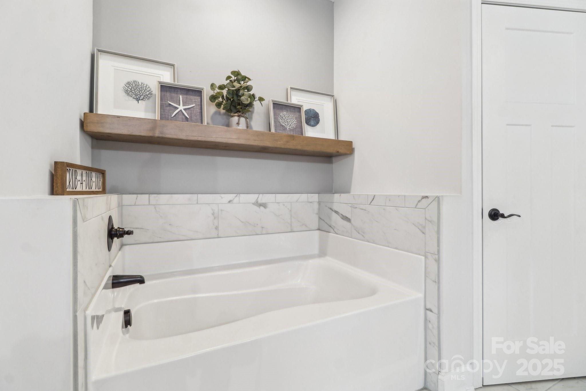 754 Culp Fergusen Drive Lancaster, SC 29720 - Photo 19 of 35 a bathroom with a bathtub