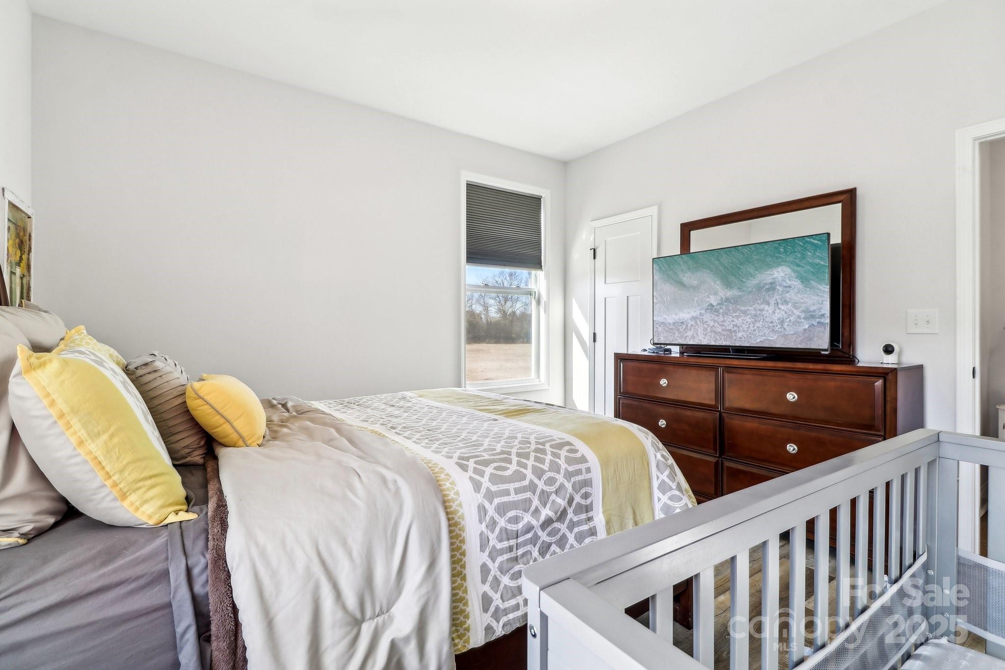 754 Culp Fergusen Drive Lancaster, SC 29720 - Photo 28 of 35 a bedroom with two beds and painting on the wall