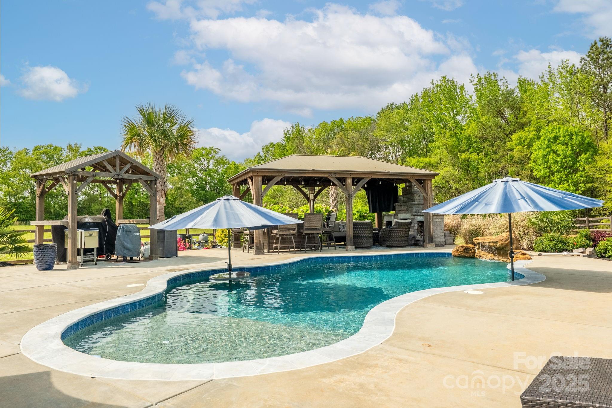 754 Culp Fergusen Drive Lancaster, SC 29720 - Photo 31 of 35 a swimming pool with outdoor seating yard and outdoor seating