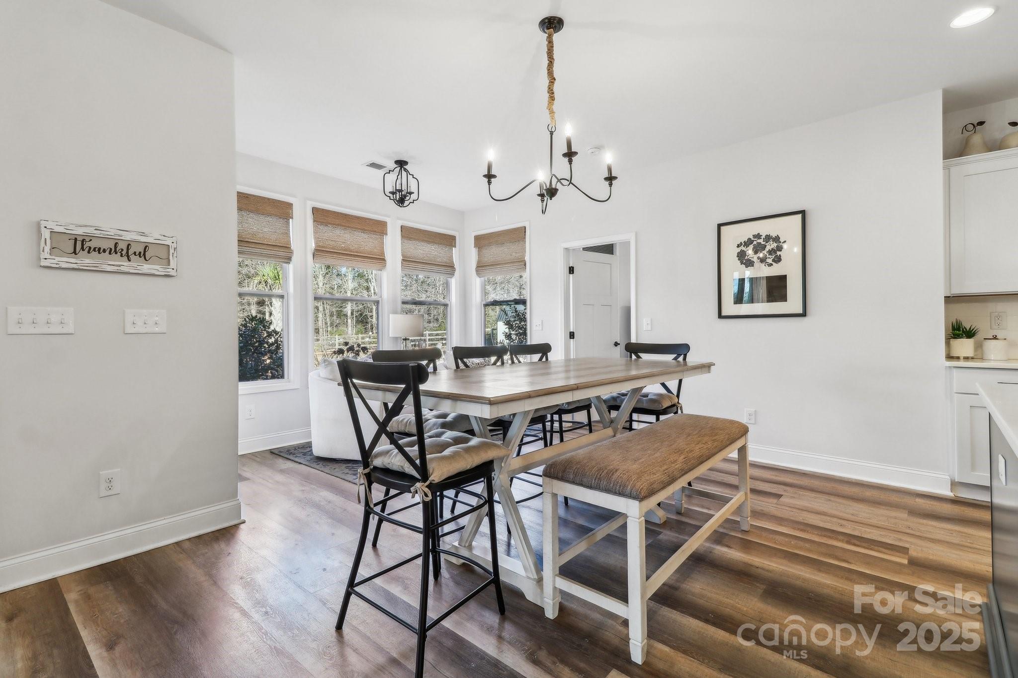 754 Culp Fergusen Drive Lancaster, SC 29720 - Photo 10 of 35 a view of a dining room with furniture window and wooden floor