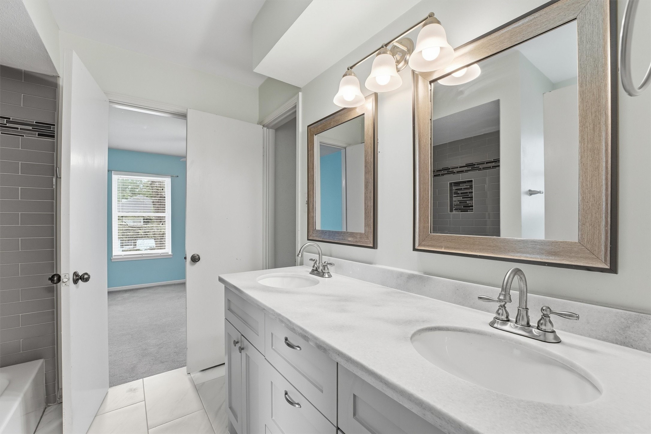 8115 Theisswood Road Spring, TX 77379 - Photo 20 of 41 updated double vanity sinks