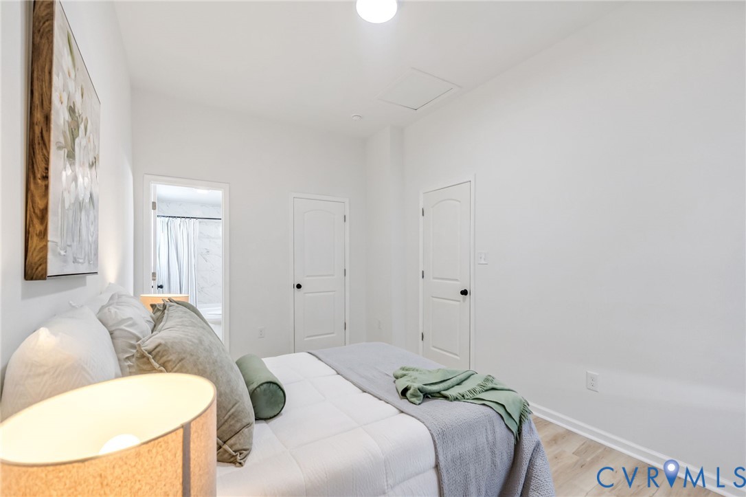 21514 Pannill Street Petersburg, VA 23803 - Photo 9 of 21 a bed room with a bed and a couch