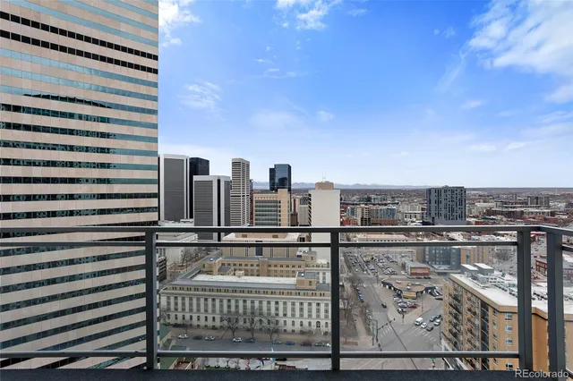 a view of a balcony with city view