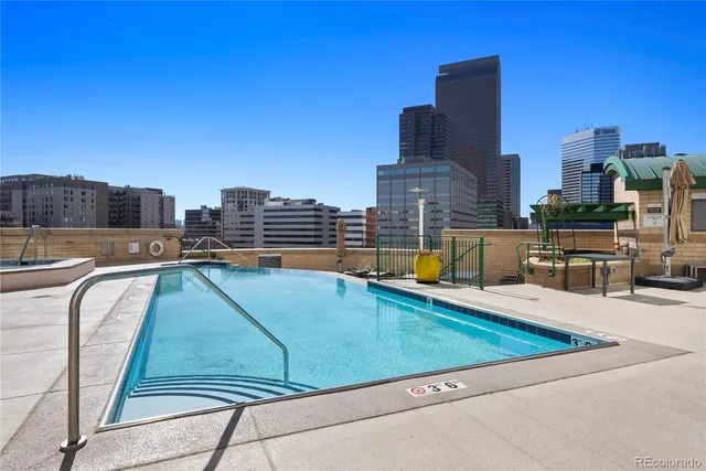 a view of a swimming pool with a terrace