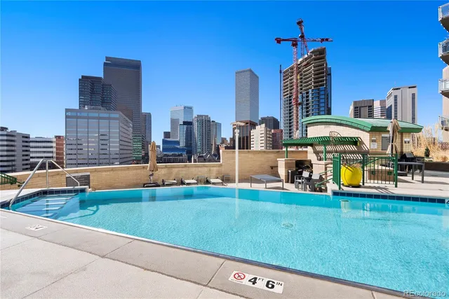 a view of a city with tall buildings