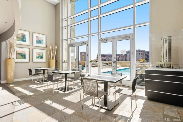 a view of a building with outdoor seating