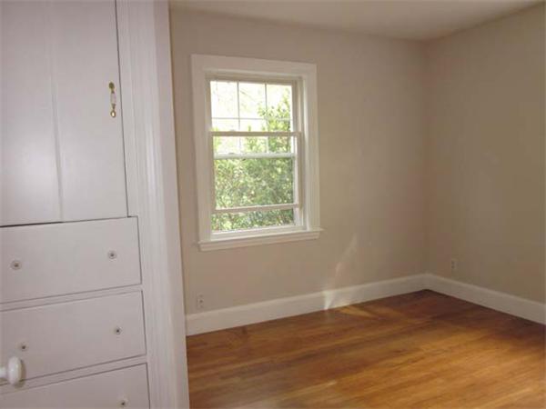 57 Prospect Road Andover, MA 01810 - Photo 8 of 14 a view of a room that has a window in it