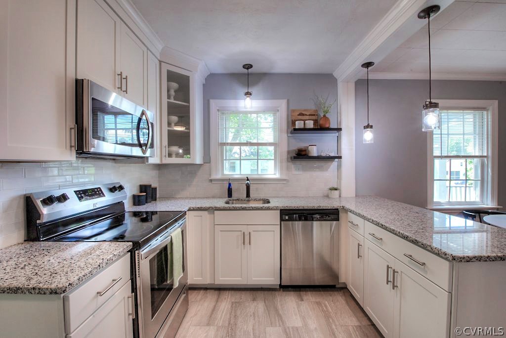 2205 Newman Road Richmond, VA 23231 - Photo 15 of 30 Another view of the kitchen featuring a peninsula