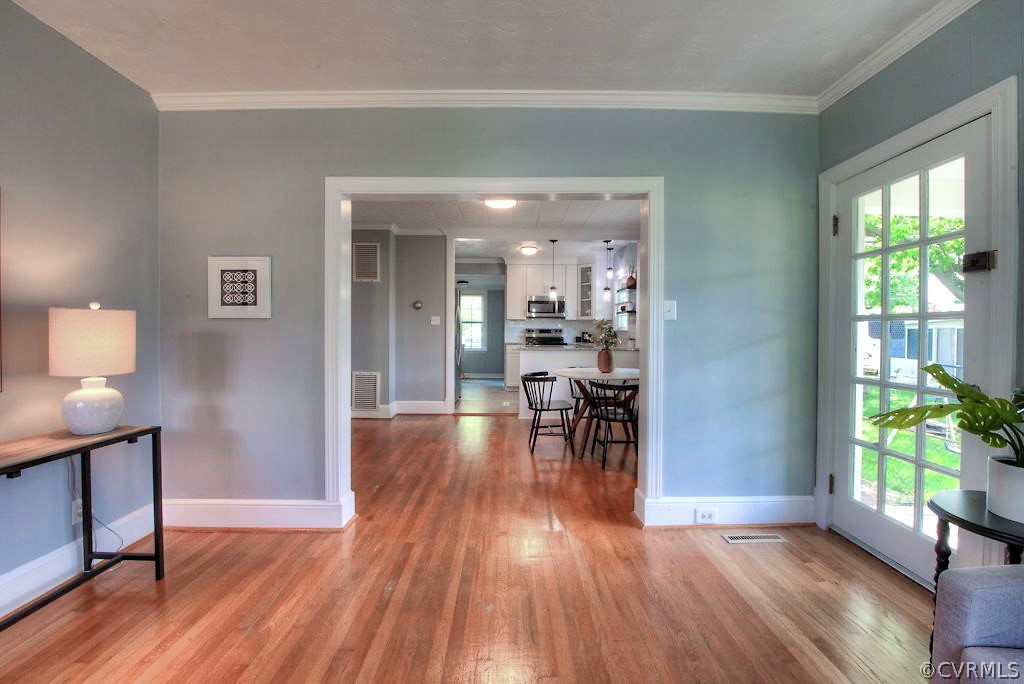 2205 Newman Road Richmond, VA 23231 - Photo 7 of 30 The door on the right leads to a charming side por