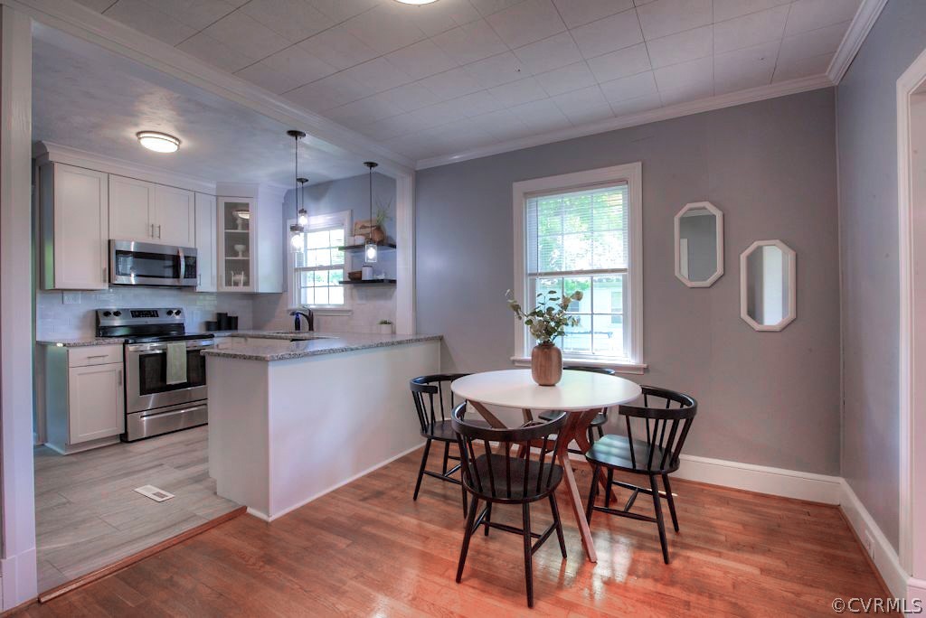 2205 Newman Road Richmond, VA 23231 - Photo 9 of 30 Another view of the dining area, which is open to