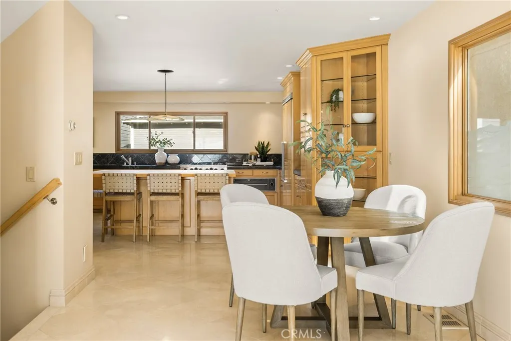 78 Surfside Avenue Surfside, CA 90743 - Photo 23 of 45 a dining room with furniture and window