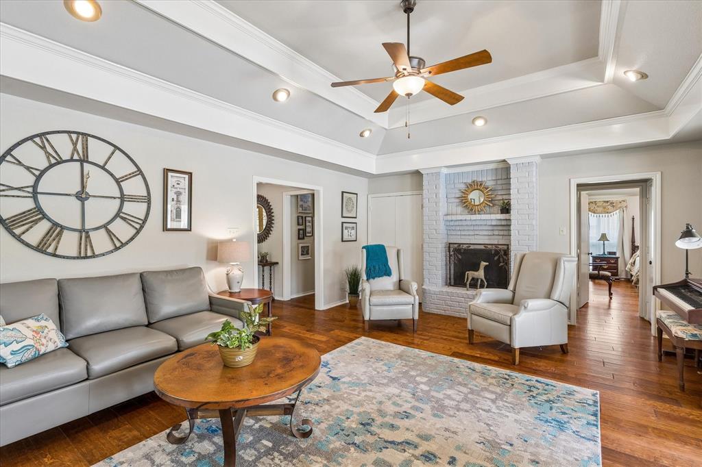 404 Moonlight Lane Keller, TX 76248 - Photo 7 of 40 a living room with furniture and a wooden floor