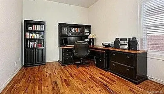 a view of a workspace with furniture