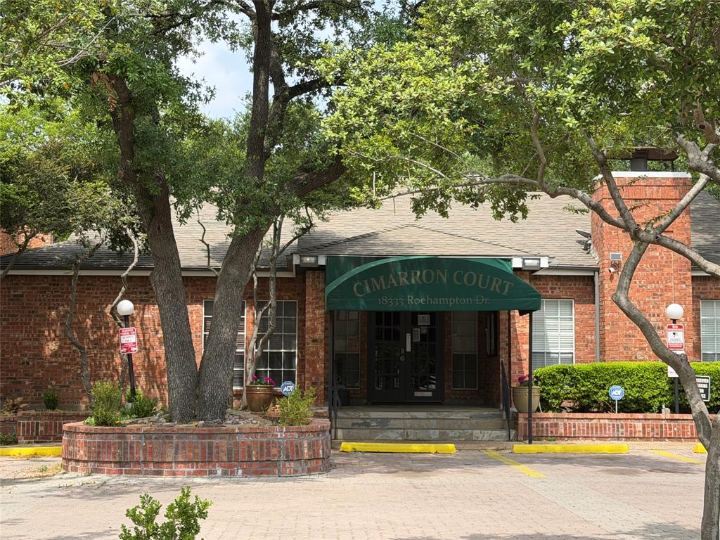 18333 Roehampton Drive, Unit 624 Dallas, TX 75252 - Photo 2 of 39 a view of a building with a swimming pool