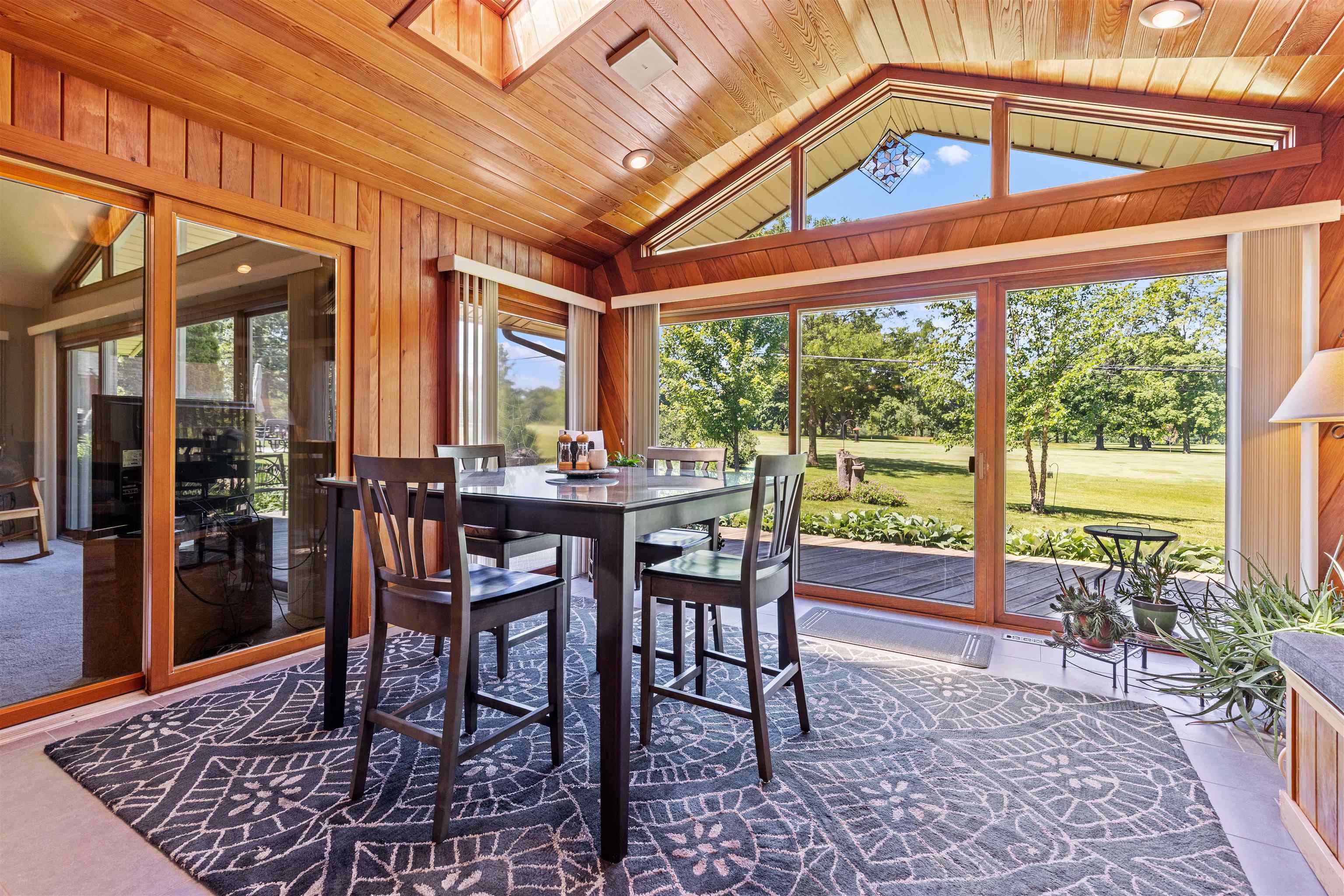 818 Roxbury Road Rockford, IL 61107 - Photo 16 of 29 a view of a dining room with furniture window and outside view
