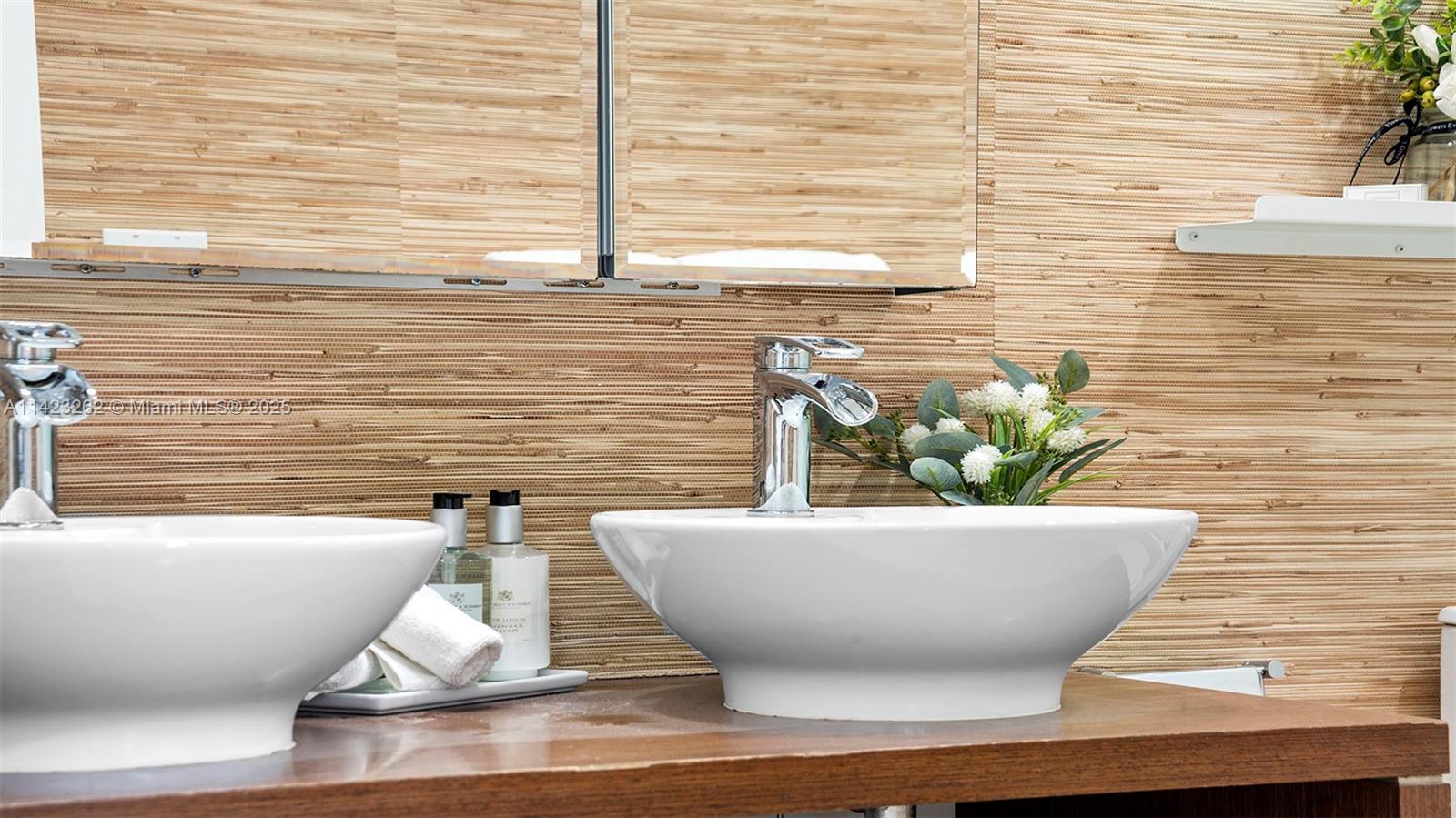 Mid Beach Miami Beach, FL 33139 - Photo 29 of 30 a view of a white bath tub sitting in a bathroom