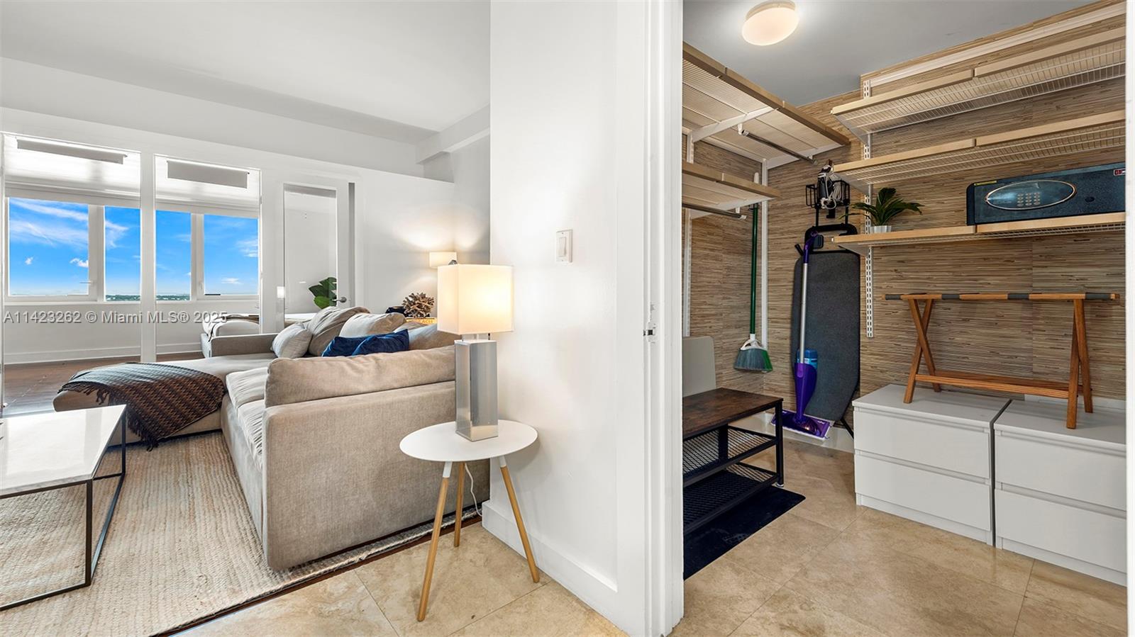 Mid Beach Miami Beach, FL 33139 - Photo 30 of 30 a living room with furniture and a fireplace