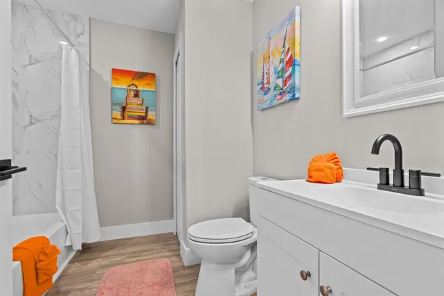 a bathroom with a sink and a toilet