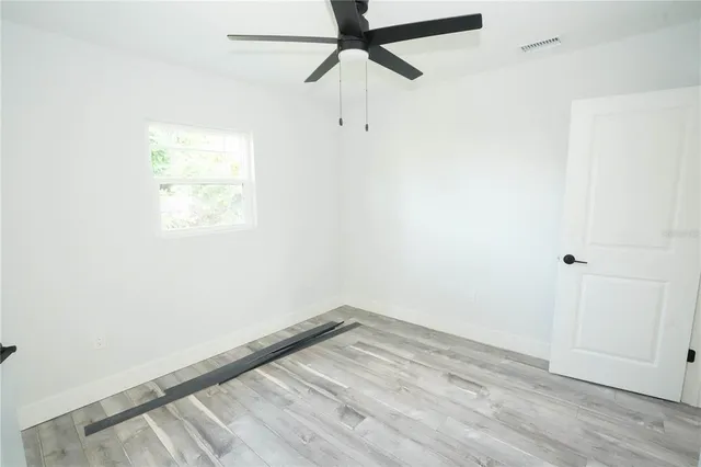 a view of a backyard with green space