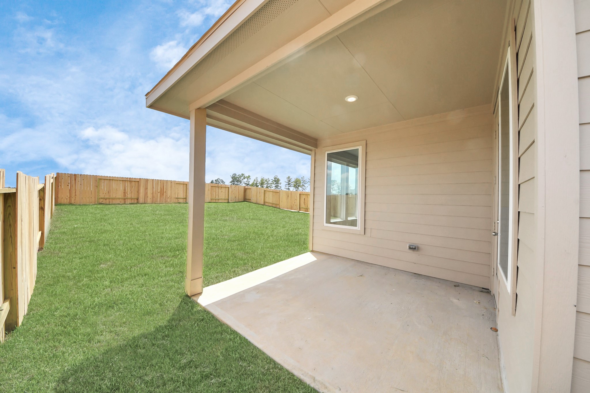 14439 Trumpet Lane Splendora, TX 77372 - Photo 23 of 37 a view of an empty room and window