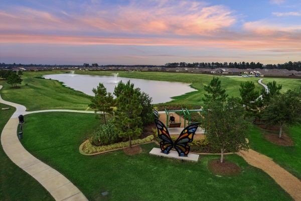 14439 Trumpet Lane Splendora, TX 77372 - Photo 27 of 37 an aerial view of a golf course with chairs