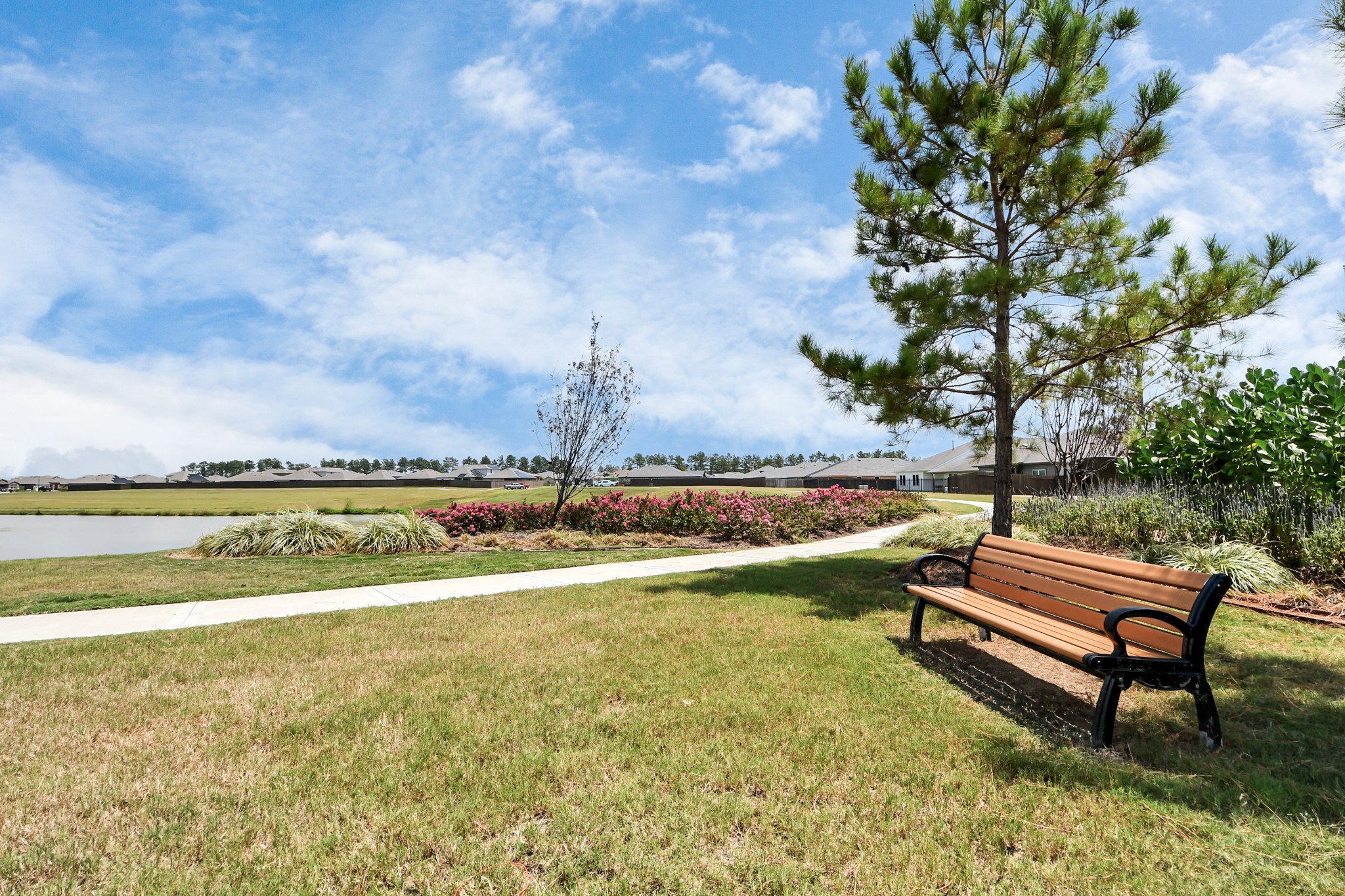 14439 Trumpet Lane Splendora, TX 77372 - Photo 34 of 37 a view of a swimming pool and lake view