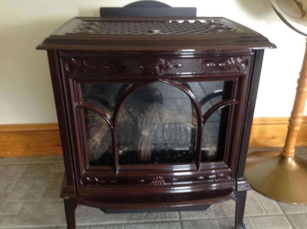 39 Bellsqueeze Road Benton, ME 04901 - Photo 16 of 35 Gas stove in den