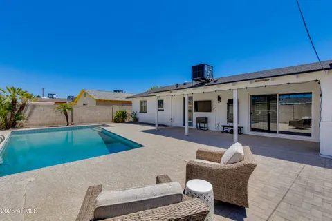 a outdoor space with patio area and furniture