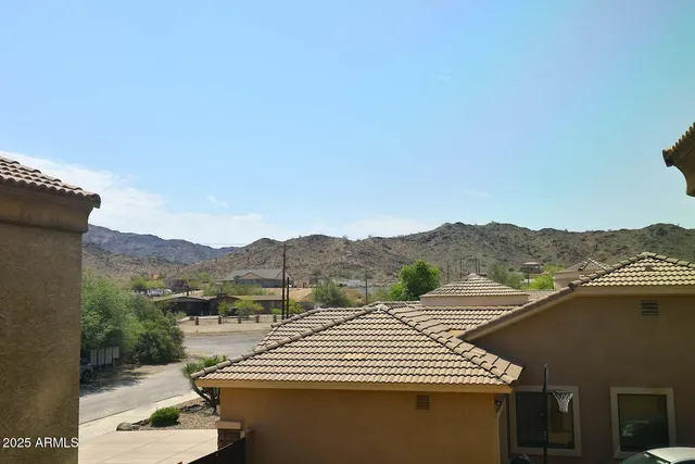 a living room with furniture and windows