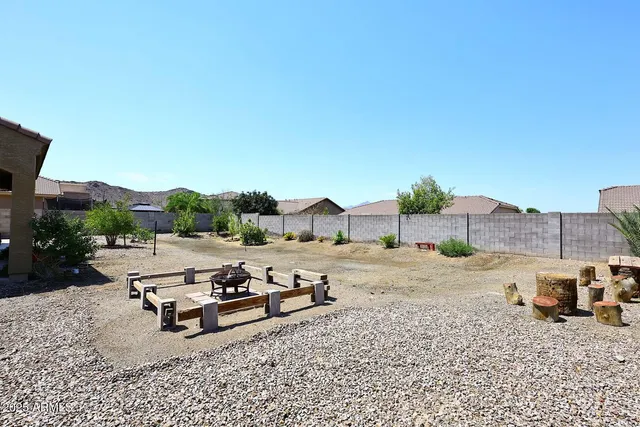 an aerial view of a residential apartment building with a yard
