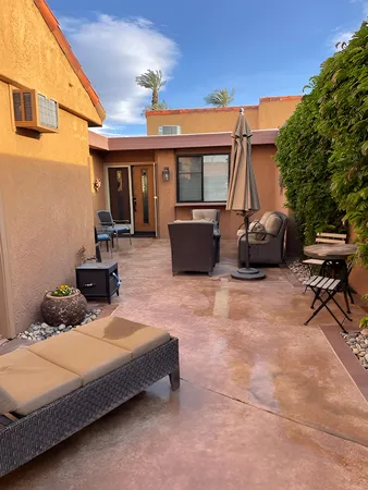 a kitchen with refrigerator and window