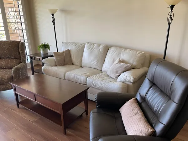 a view of a patio with swimming pool