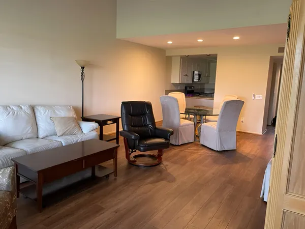 a view of a swimming pool and a chairs