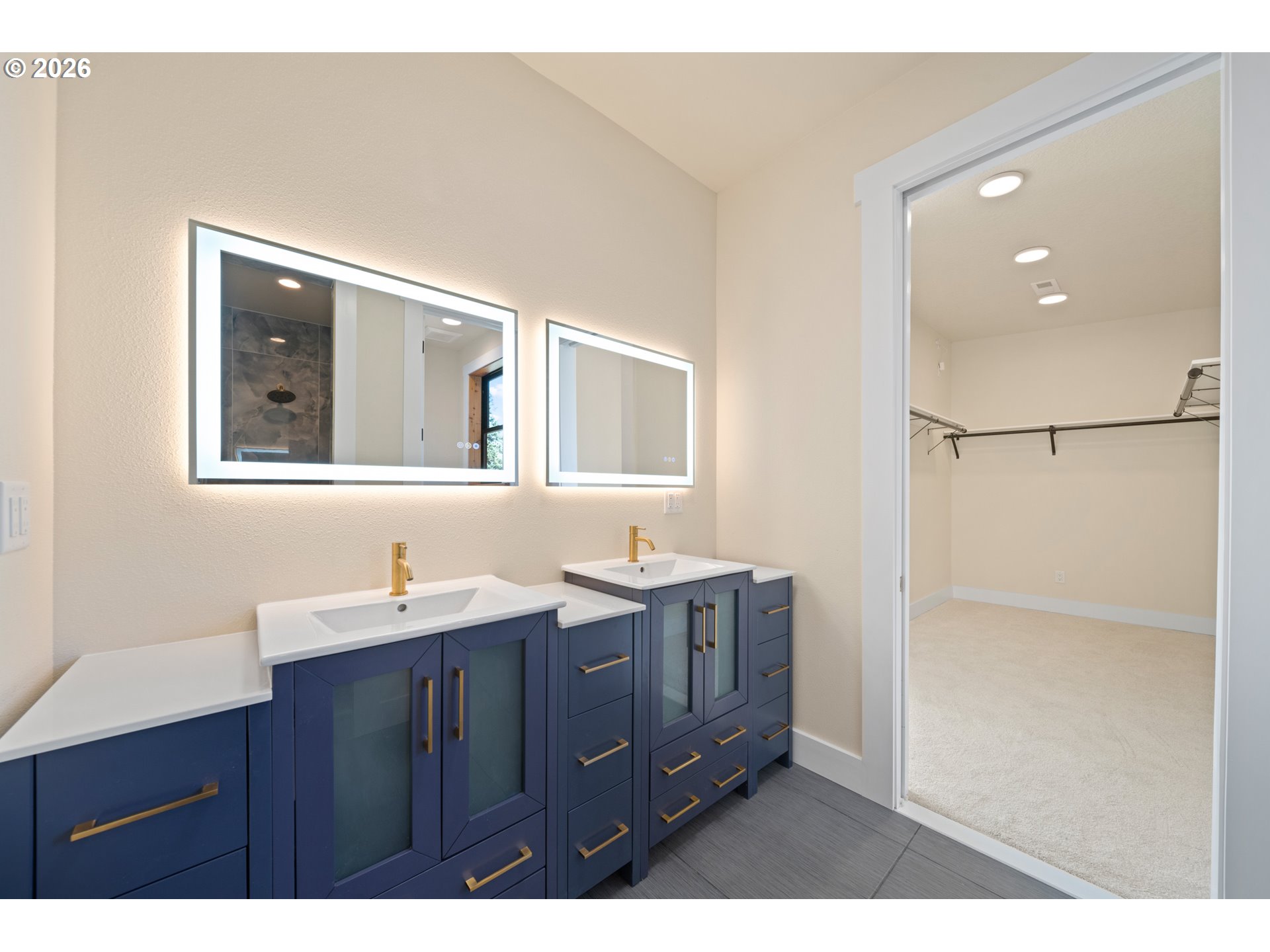120 Victoria Circle Kalama, WA 98625 - Photo 23 of 44 a bathroom with a double vanity sink and mirror