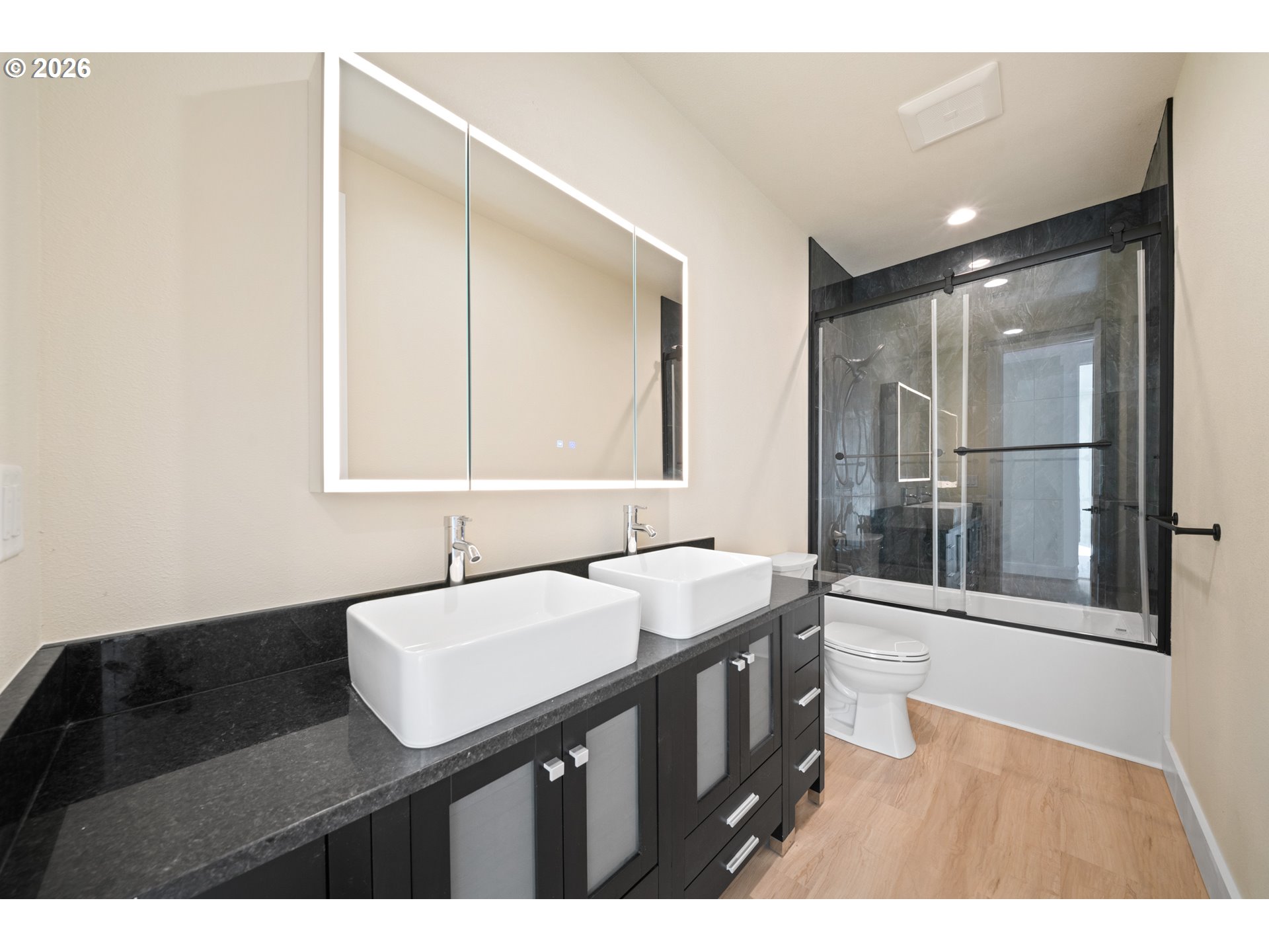 120 Victoria Circle Kalama, WA 98625 - Photo 27 of 44 a bathroom with a sink a toilet and mirror