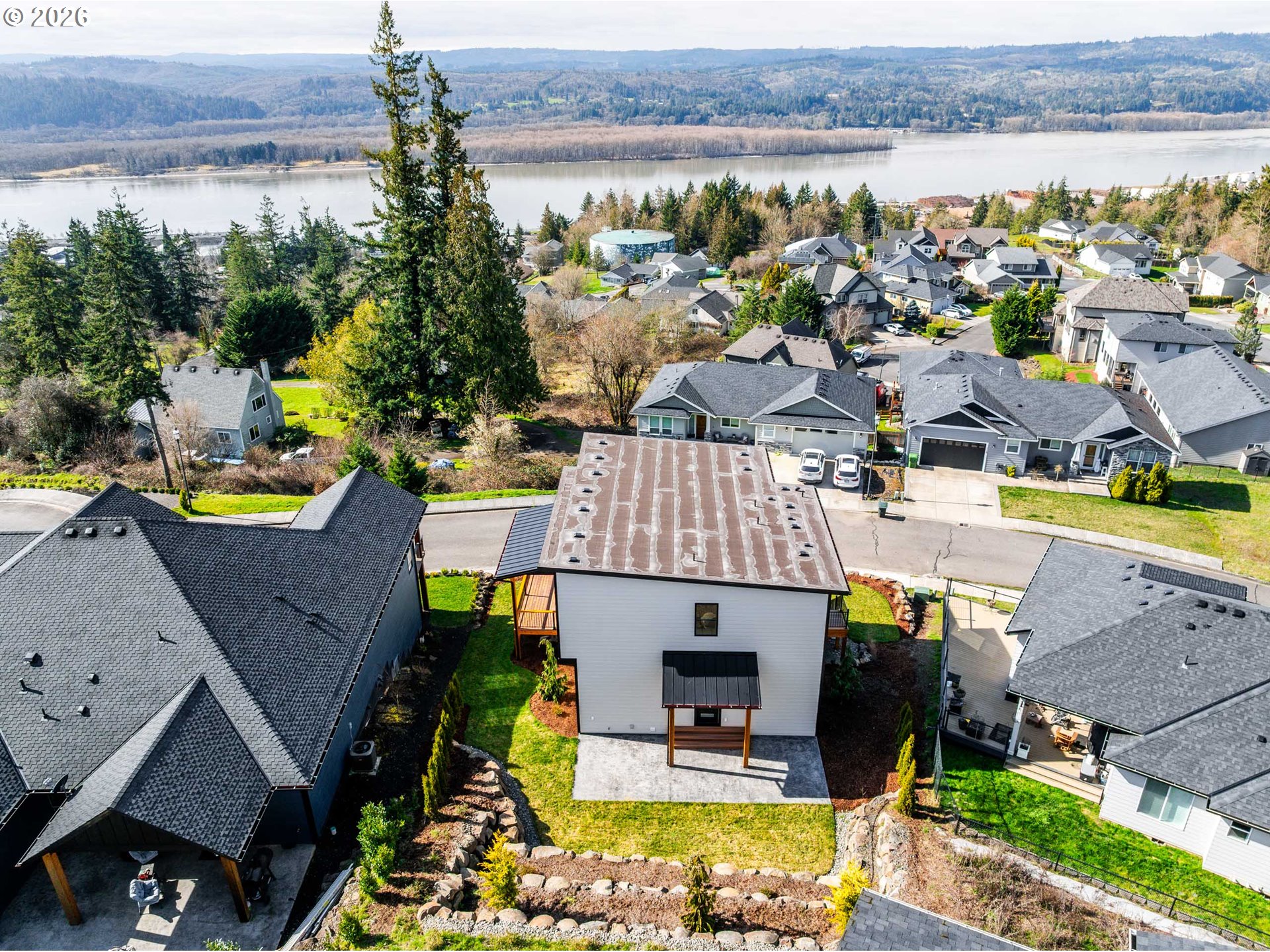 120 Victoria Circle Kalama, WA 98625 - Photo 42 of 44 an aerial view of a house with a swimming pool outdoor seating and yard