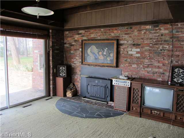 2310 Beckner Road Lexington, NC 27292 - Photo 8 of 9 Den/Family/Great Room. Family Room in Basement w/ Stove Insert