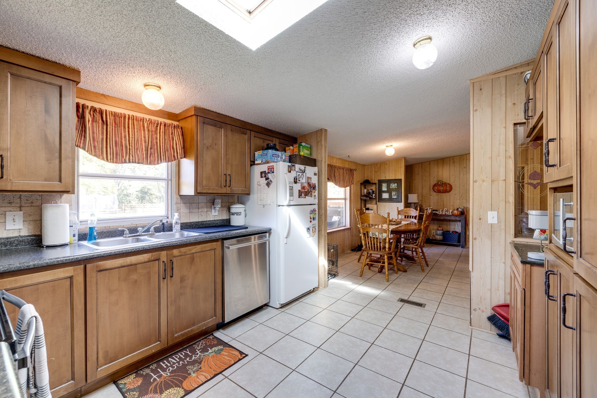254 Borum Road Watertown, TN 37184 - Photo 17 of 51 a kitchen with sink cabinets and outdoor space